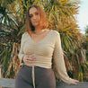 woman wearing sand color cinch top